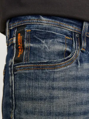 Mörka slim fit jeans med stentvättad yta - GLENN