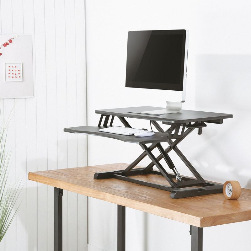 Höjdjusterbar skrivbordshöjare Sitt/Stå