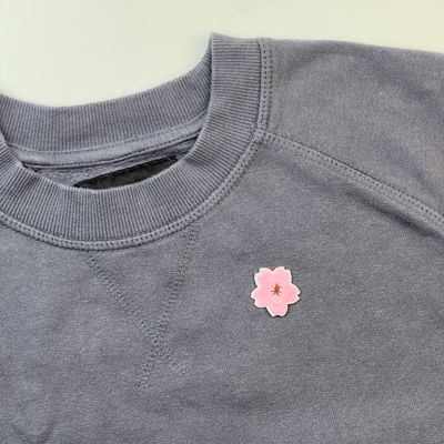 Liten blomst - Tøymerke