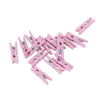 små rosa klädnypor