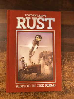 RUST HC VOL 01 VISITOR IN FIELD