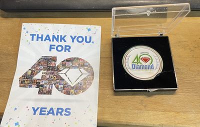 DCD DIAMOND COMIC DISTRIBUTORS 40 YEAR COMMERATIVE CHALLENGE COIN