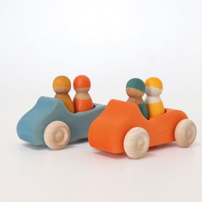 Personbil med två regnbågsvänner, orange