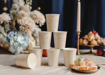 Pappmugg beige med stjärnor