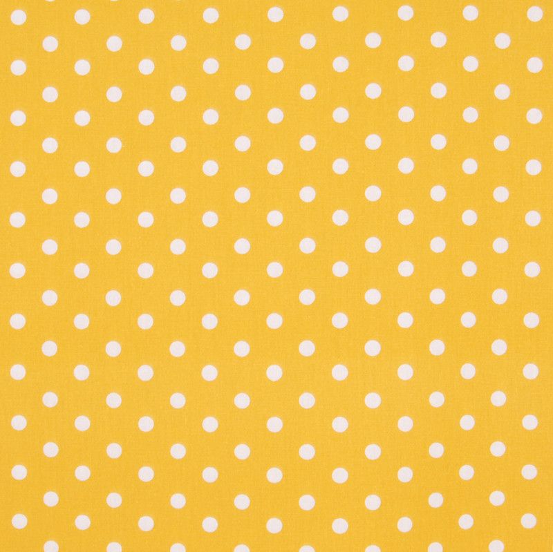Dottie gul - Bomullstyg med gul botten och vita prickar. Tyget passar bra till babynest, påslakan, gardiner och inredning.