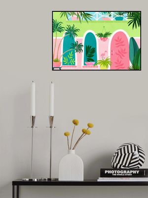 Garden Scene with Lush Green Plants Colorful Pots and a Flamingo