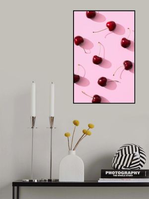Cherries on pink background