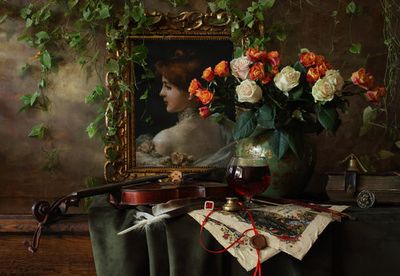 Still life with violin and flowers