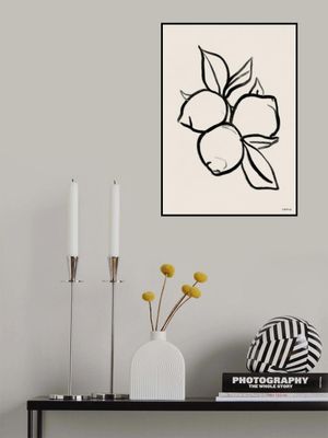 Lemons With Leaves On A Beige Background