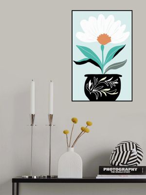 A Big Flower in a Black Vase