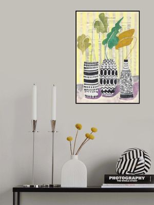 Pink flowers in a checkered vase still life