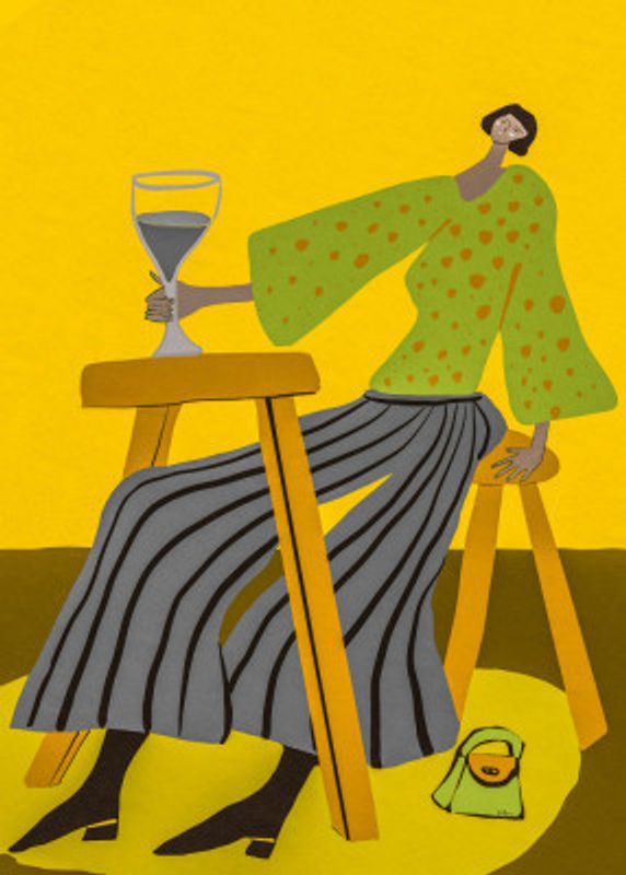 Just one glass.  Lady drinking wine