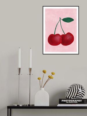 Red Cherries with a Green Leaf