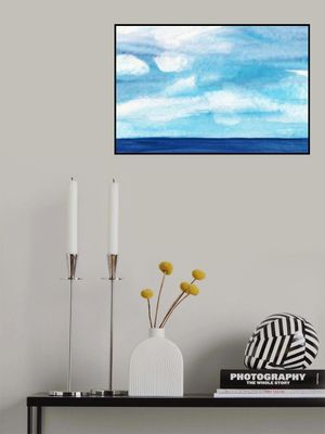 A Tranquil Blue Ocean with Cloudy Skies