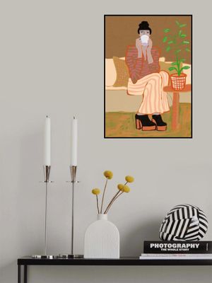 Lady having coffee Woman Sitting with pot plant