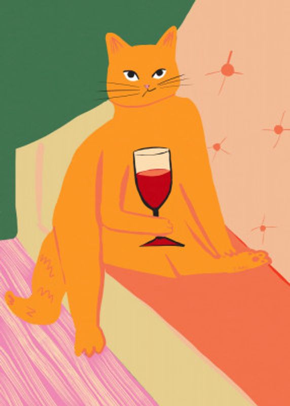 Big orange ginger cat enjoying a wine