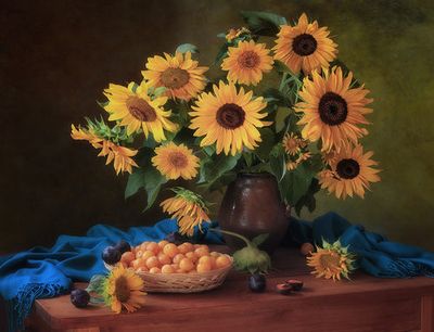 Still life with sunflowers and plums