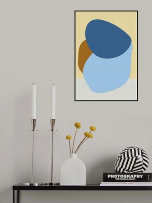 Simple shapes in pastel colors - blue, terra on butter yellow and white.