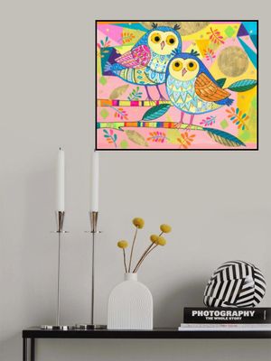 Two Owls Sit on Branches