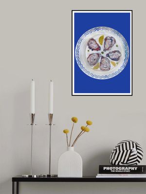 Oysters and Lemon on Blue Plate