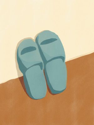 Blue Slippers On A Brown And Beige Background