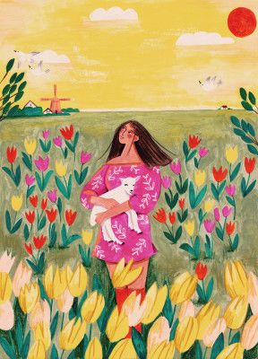 Woman in spring tulip field