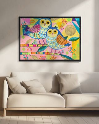 Two Owls Sit on Branches