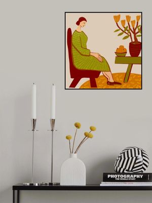 Woman sitting with pot plant