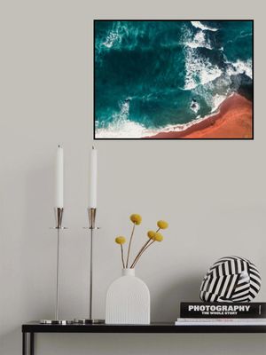 Ocean Waves Crashing Onto A Sandy Beach