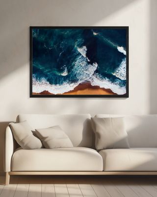 Vibrant Ocean Waves Against A Golden Sandy Beach