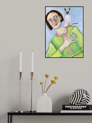 Girl with cat on shoulder