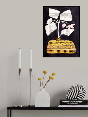 Leaves and flowers in midcentuy vase with black background