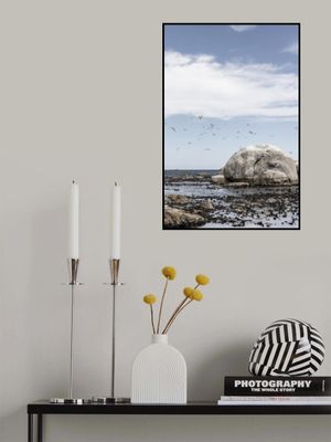 Rocky Seashore Under A Clear Sky