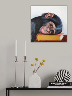 Resting Monkey Head On A Book