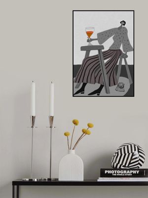 Just one glass.  Lady drinking wine