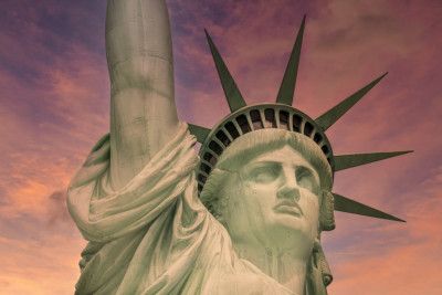 NEW YORK CITY Statue of Liberty at sunset