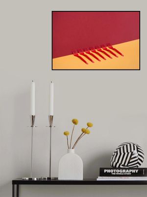 Very simple still life with red forks