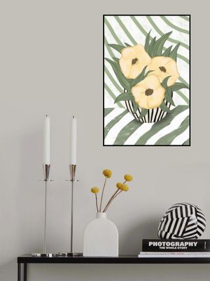 Yellow poppies in vase