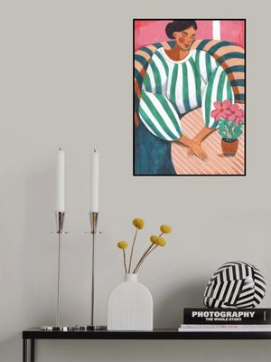 Woman in stripes in thought