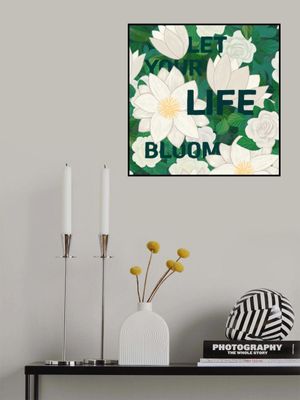 White Lotus Flowers with Lush Green Leaves