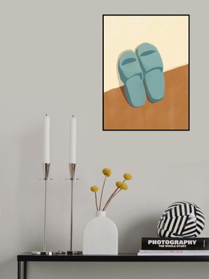Blue Slippers On A Brown And Beige Background