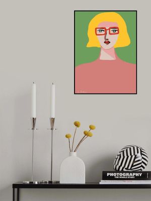 Golden hair lady with red glasses