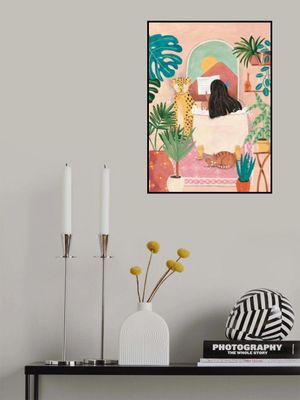 Woman taking bath in pink tropical bathroom
