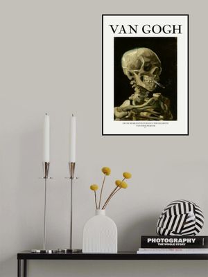 Head of a skeleton with a burning cigarette