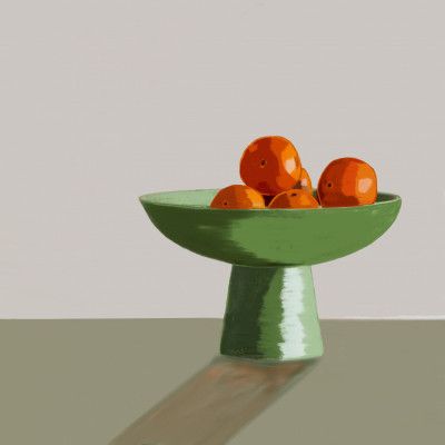Mandarins in green bowl.