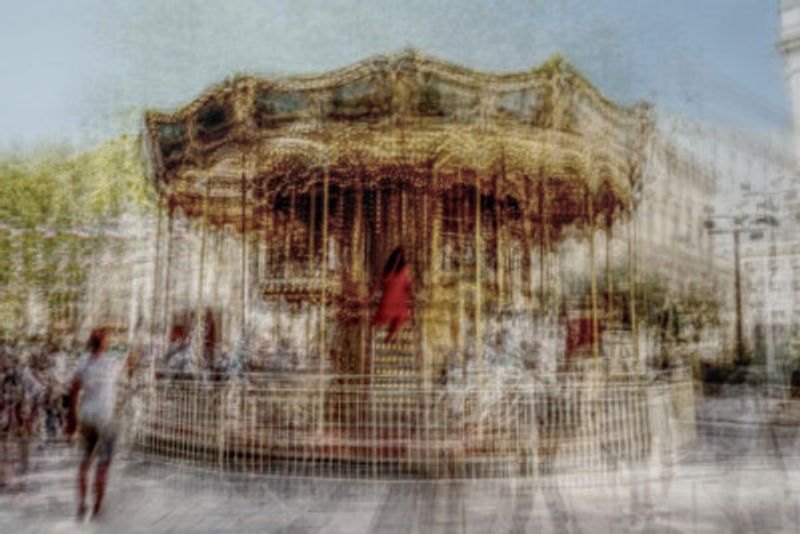 Carousel and woman in red in Avignon