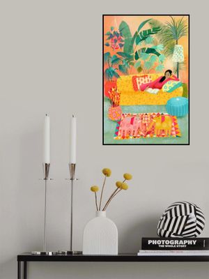 Woman Reading In Tropical Living Room