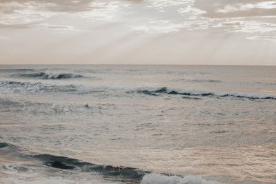 Ocean Waves Under Overcast Sky