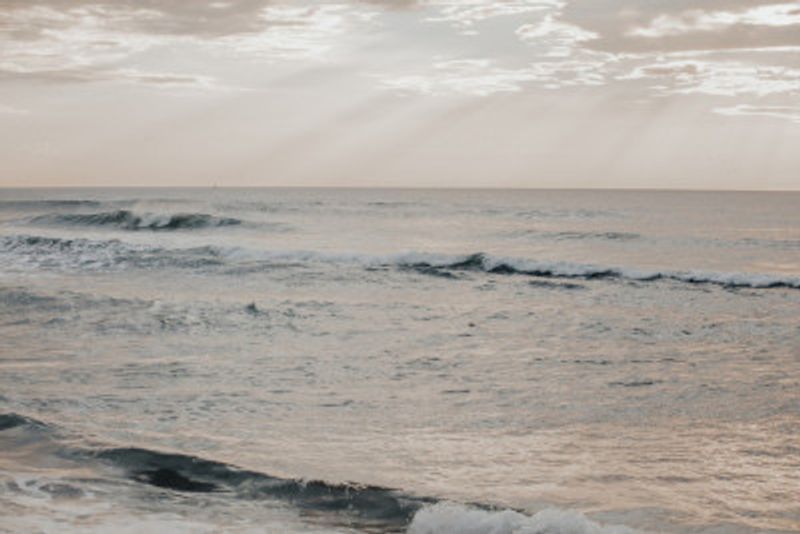 Ocean Waves Under Overcast Sky