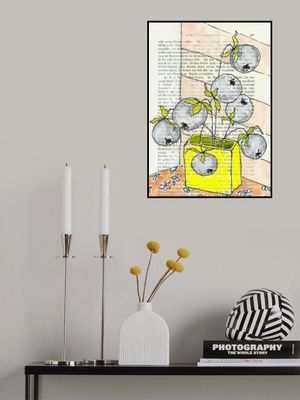 Small vase with heavy berry branches